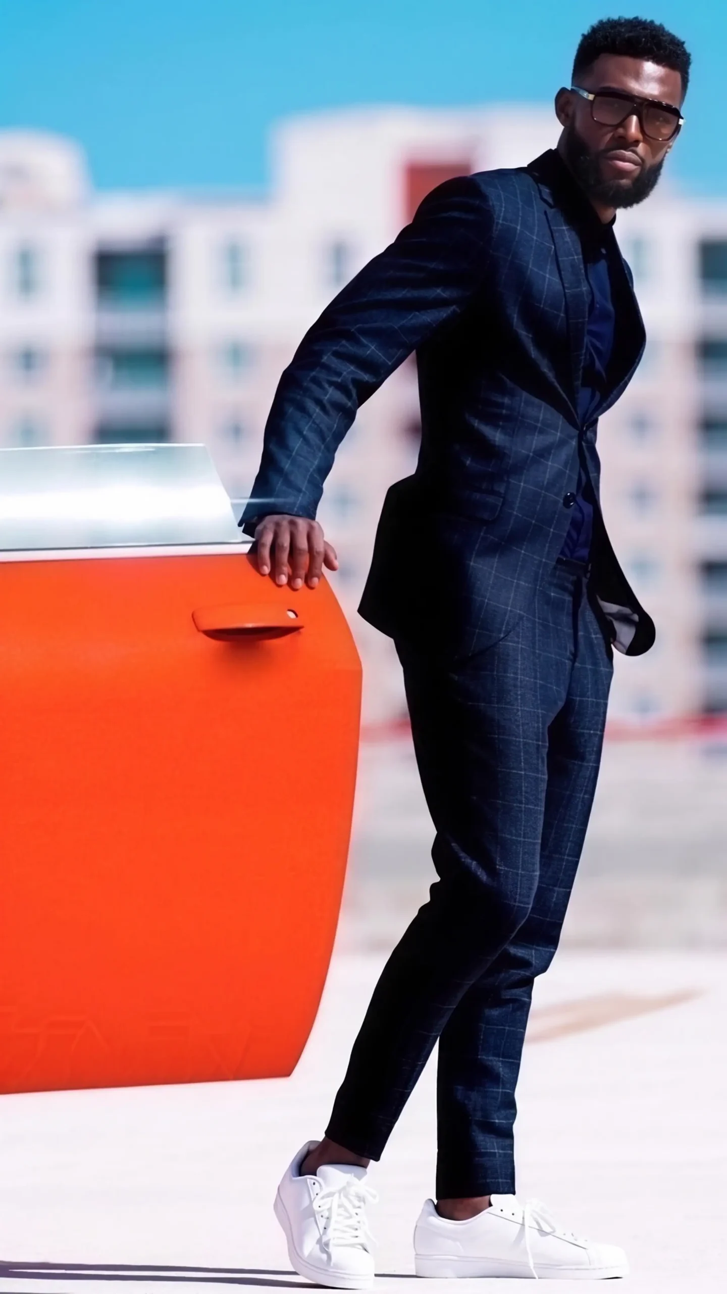 Elevated suit styled with sneakers, outfit inspiration 12